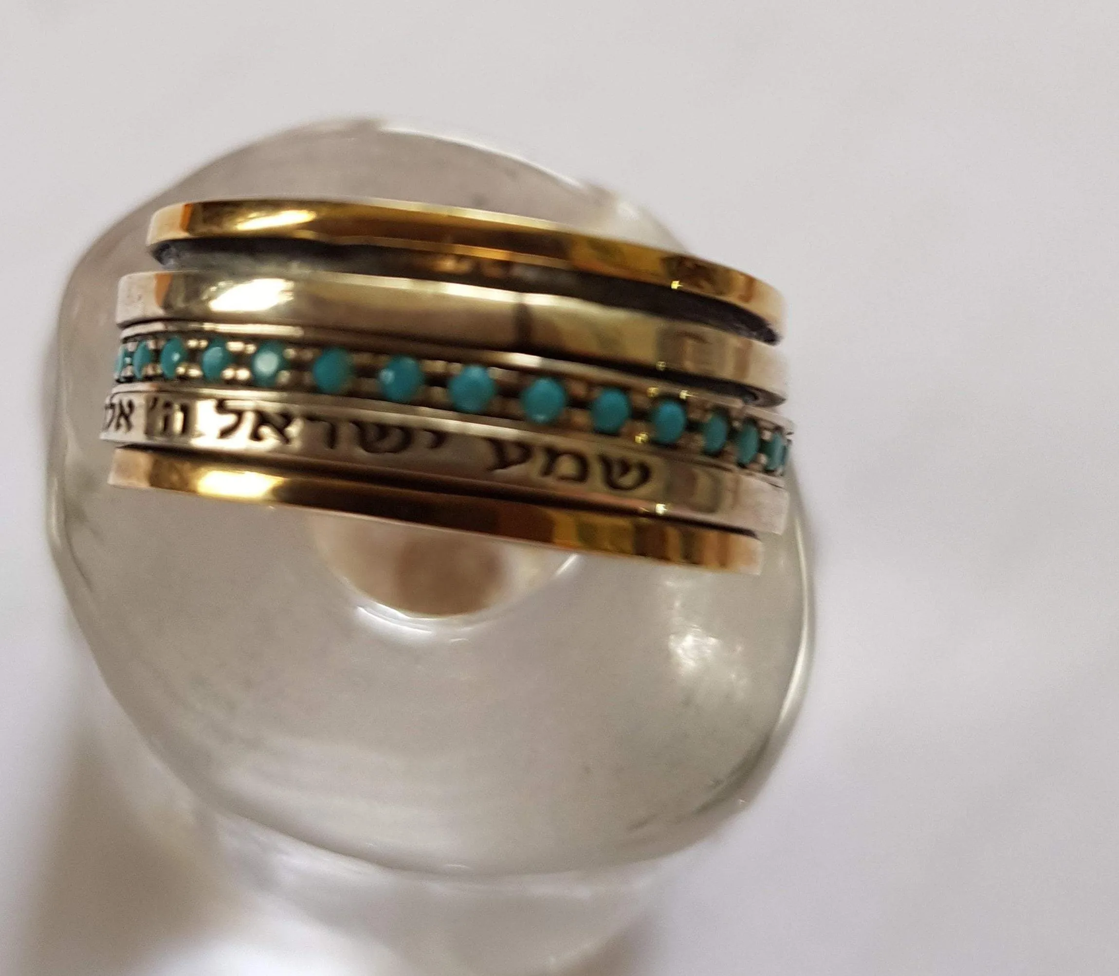Bluenoemi Spinner ring for woman set with blue opals. A Silver & Gold wish and bless Love Ring.